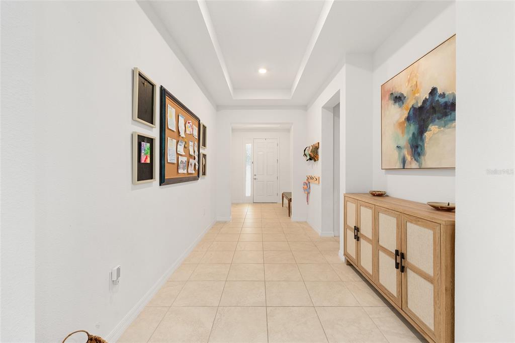 7431 Southwest 65th Place Road Ocala, FL 34474 - Photo 3 of 49 a view of a hallway with a furniture