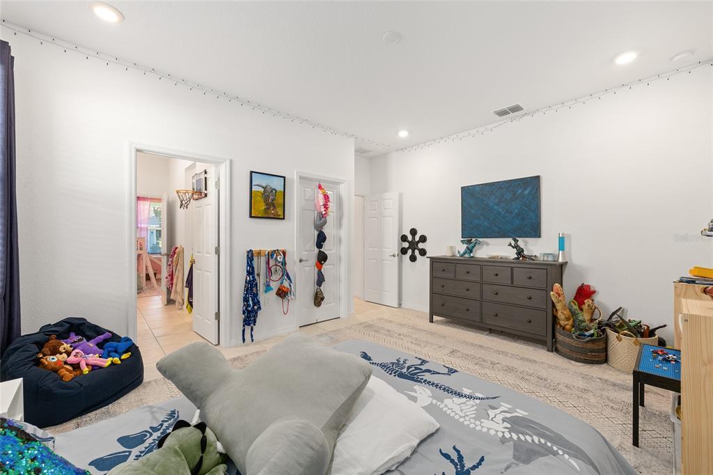 7431 Southwest 65th Place Road Ocala, FL 34474 - Photo 31 of 49 a livingroom with furniture and a flat screen tv