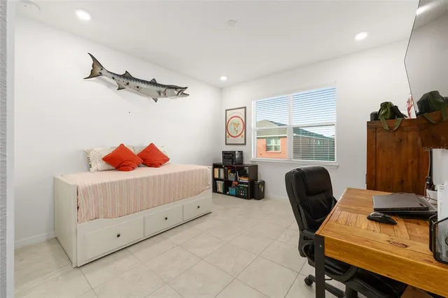 a bedroom with furniture and a bed