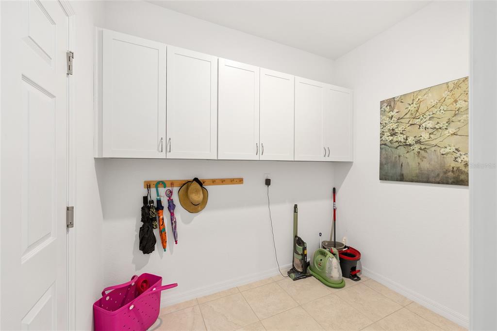7431 Southwest 65th Place Road Ocala, FL 34474 - Photo 36 of 49 a view of a storage & utility room with utility racks