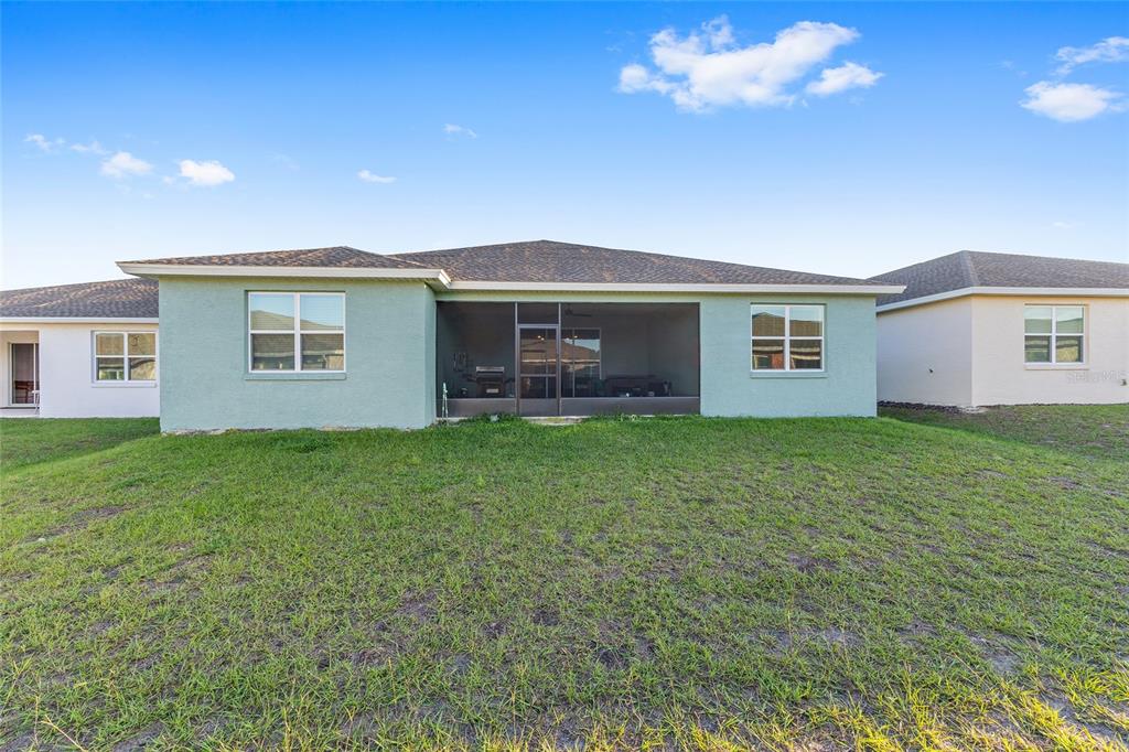 7431 Southwest 65th Place Road Ocala, FL 34474 - Photo 40 of 49 a front view of house with yard and green space