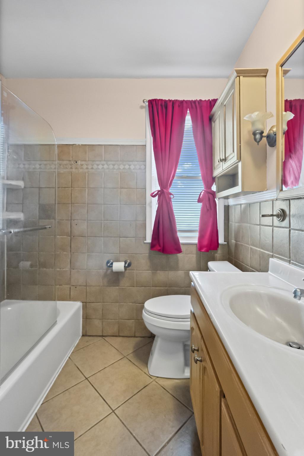 1205 Sheridan Avenue Baltimore, MD 21239 - Photo 12 of 22 Charming bathroom with vibrant accents.