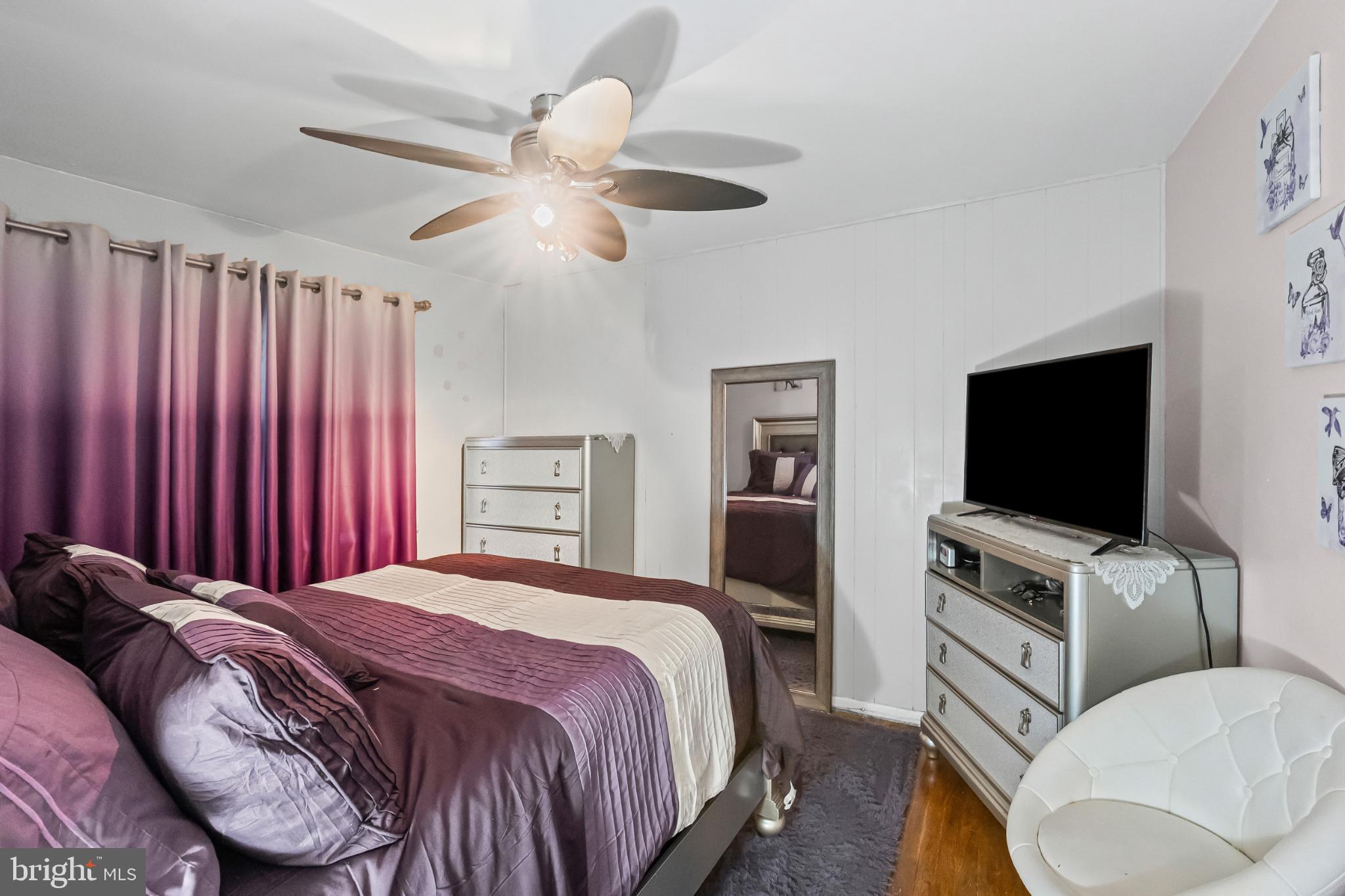 1205 Sheridan Avenue Baltimore, MD 21239 - Photo 14 of 22 Cozy bedroom with elegant color palette.