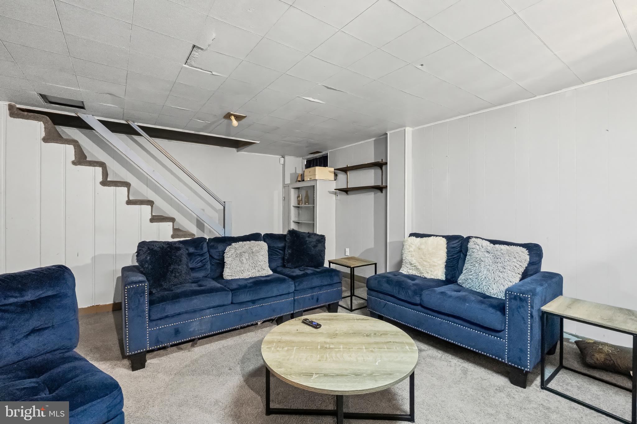 1205 Sheridan Avenue Baltimore, MD 21239 - Photo 19 of 22 Cozy basement retreat with modern charm.