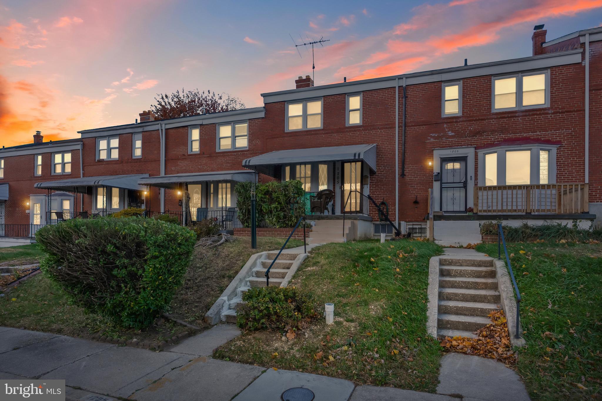 1205 Sheridan Avenue Baltimore, MD 21239 - Photo 3 of 22 Charming brick homes at sunset glow.