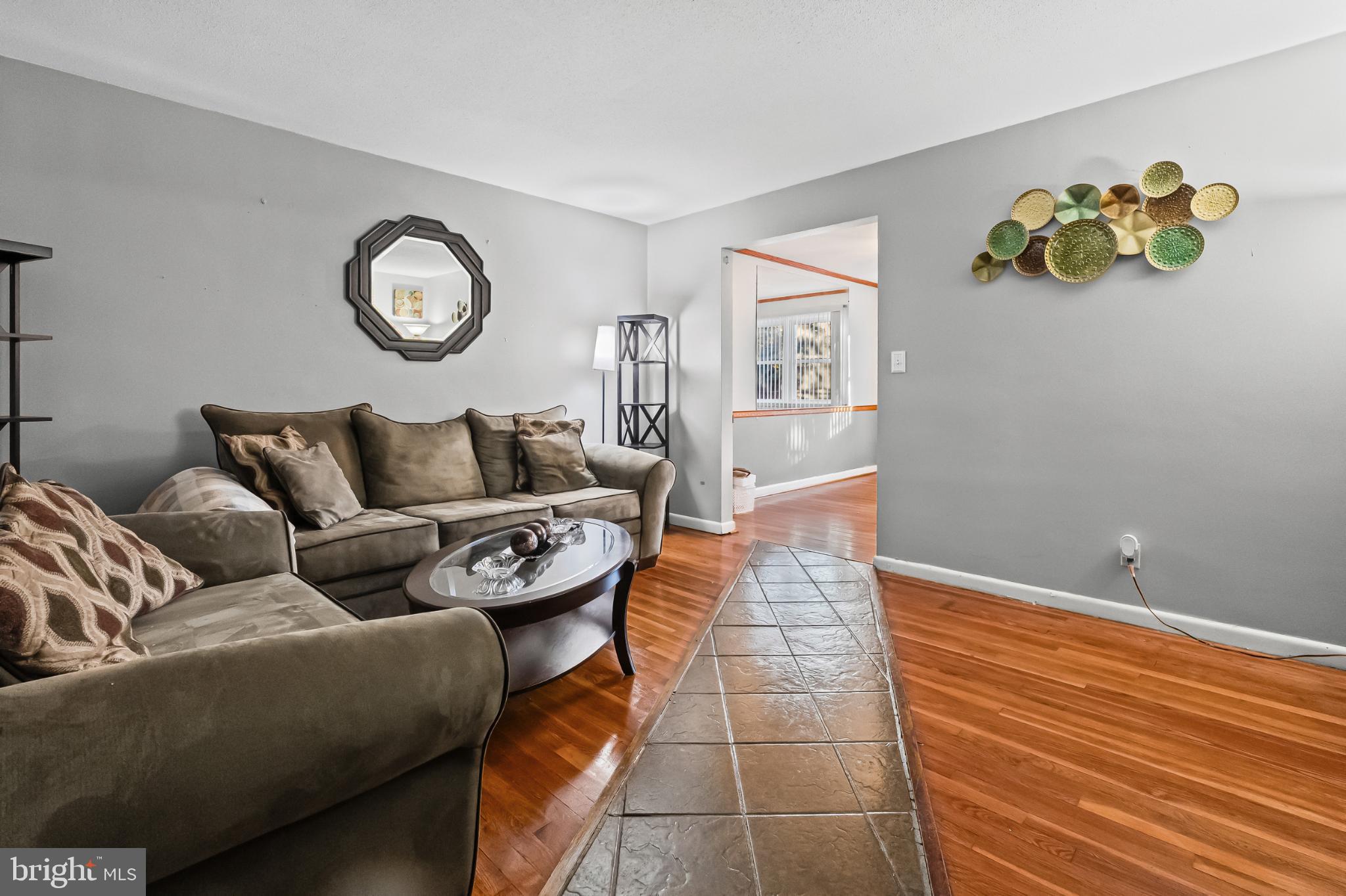 1205 Sheridan Avenue Baltimore, MD 21239 - Photo 4 of 22 Inviting living space with warm wood tones.