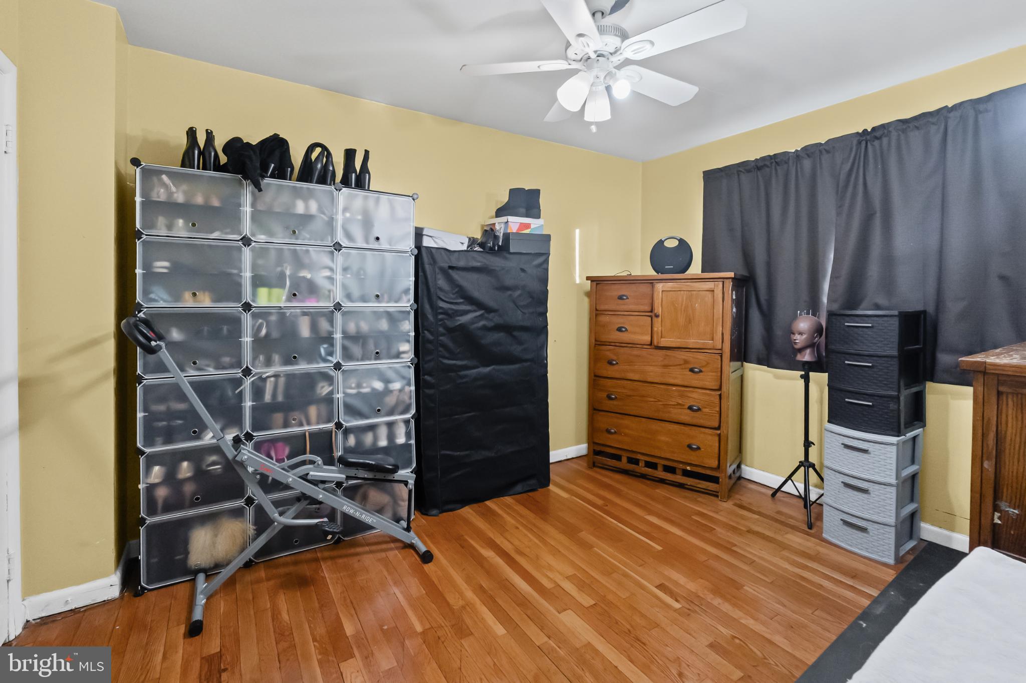 1205 Sheridan Avenue Baltimore, MD 21239 - Photo 10 of 22 Cozy room with warm tones and ample storage.