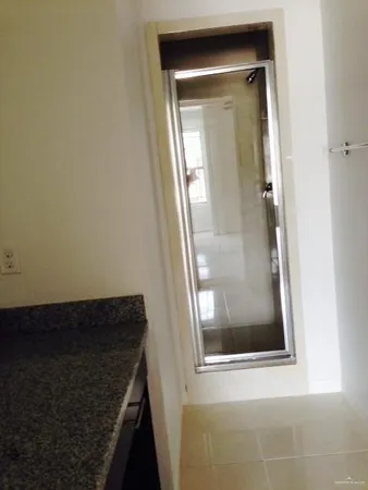 an empty room with a door