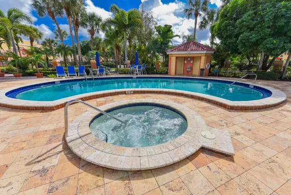 a view of swimming pool with a garden
