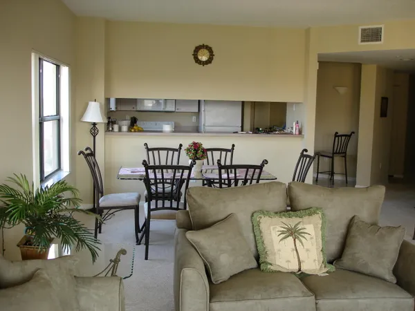 a living room with furniture and view of living room