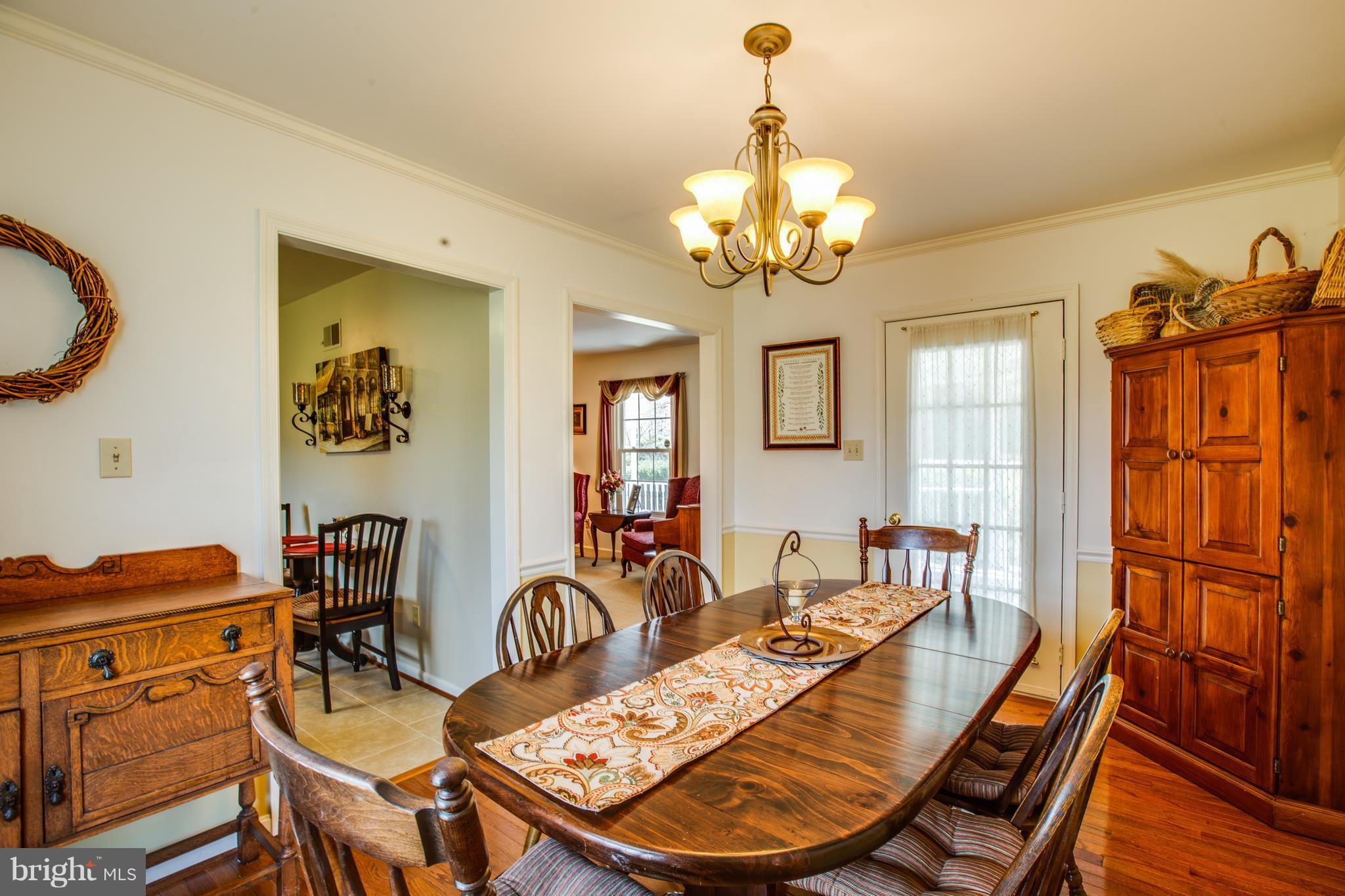 7109 Stuart Road King George, VA 22485 - Photo 15 of 30 Formal Dining Room with gleaming Hardwood Floors!
