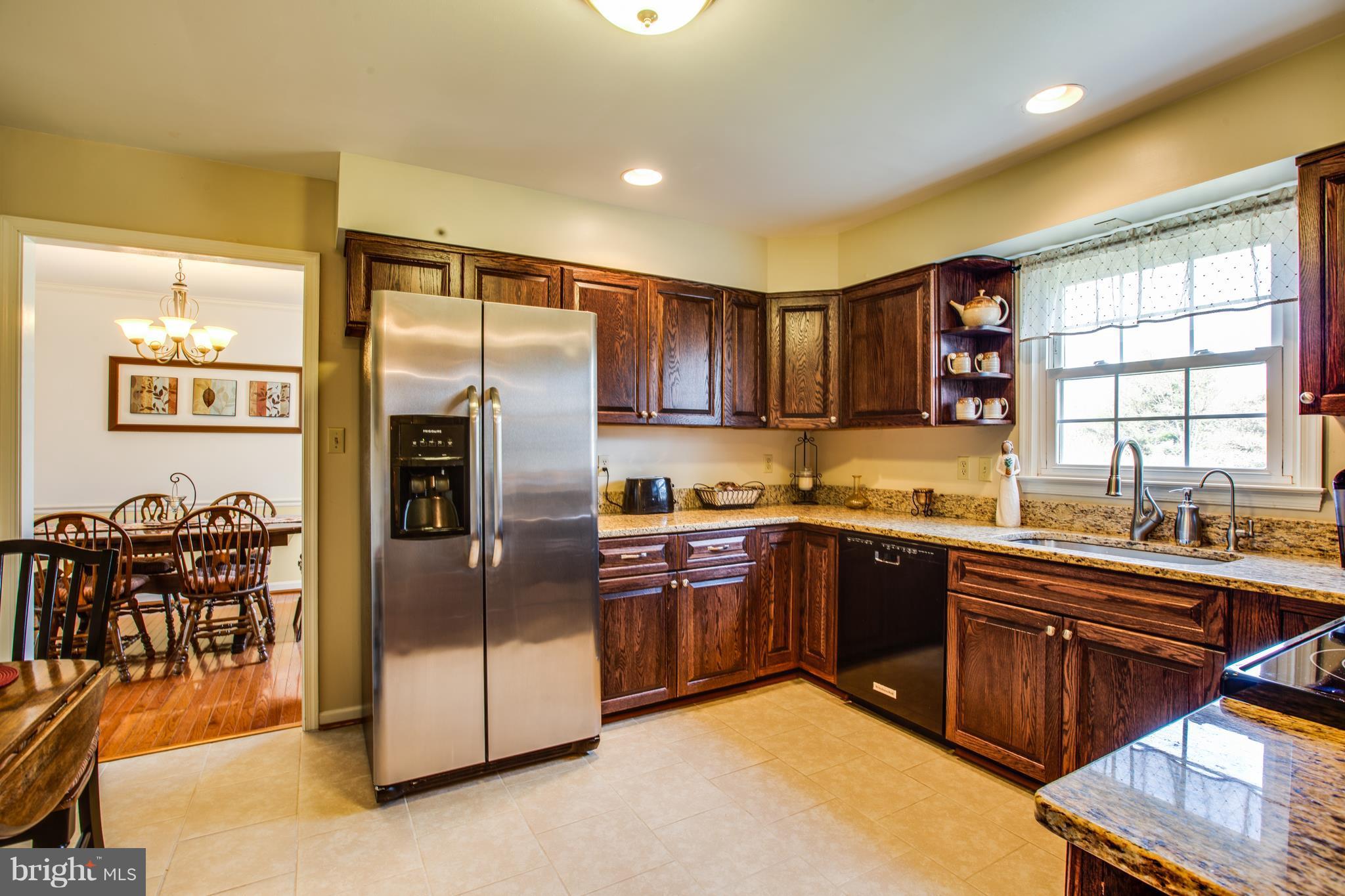 7109 Stuart Road King George, VA 22485 - Photo 17 of 30 Spacious Kitchen w/SS Appliances