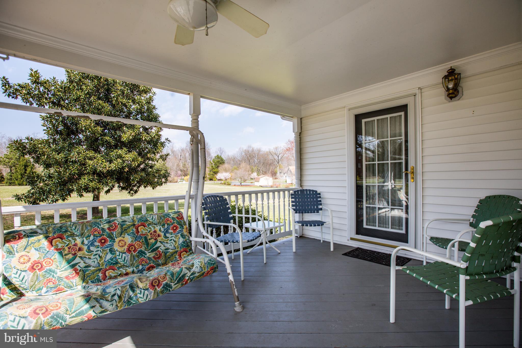 7109 Stuart Road King George, VA 22485 - Photo 7 of 30 Dreamy Porch for Summer Lemonade Sipping!