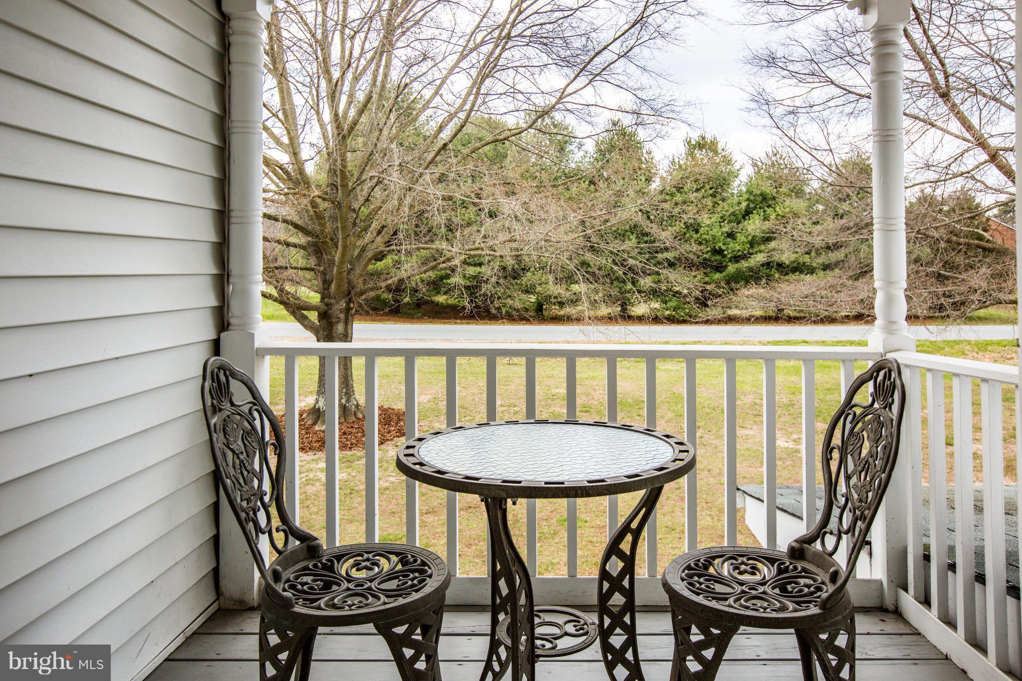 7109 Stuart Road King George, VA 22485 - Photo 8 of 30 Cozy Spot for catching up wi/friends on the porch.