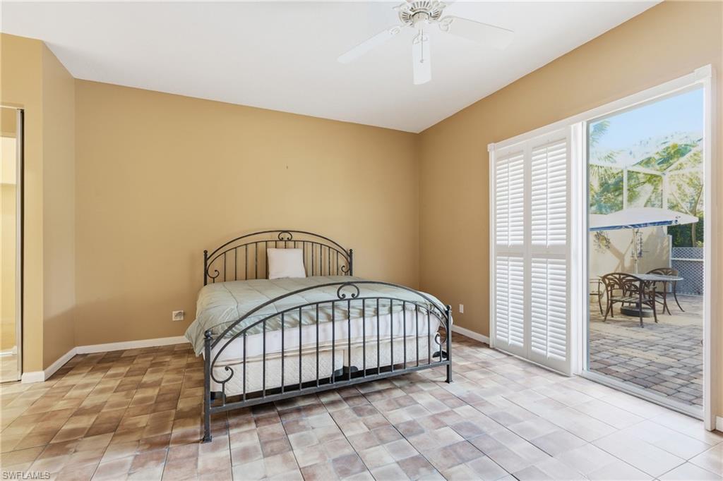 5902 Bermuda Lane Naples, FL 34119 - Photo 11 of 18 a view of a bedroom with furniture and bedroom view