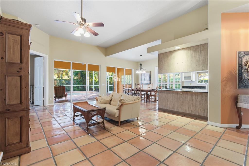 5902 Bermuda Lane Naples, FL 34119 - Photo 5 of 18 a view of a dining room with furniture window and outside view