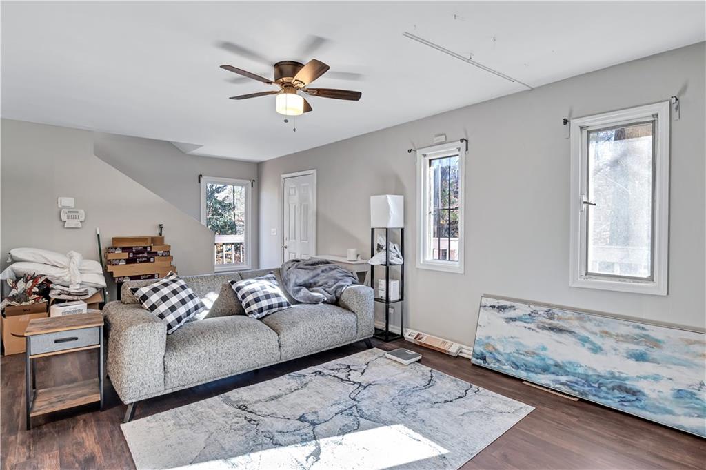 1920 Moores Mill Road Northwest Atlanta, GA 30318 - Photo 20 of 33 a living room with furniture and a window