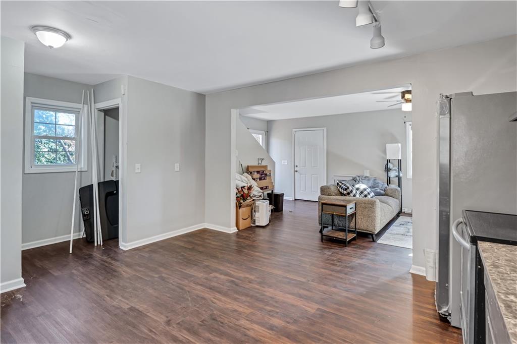 1920 Moores Mill Road Northwest Atlanta, GA 30318 - Photo 23 of 33 a view of a livingroom with furniture and a livingroom