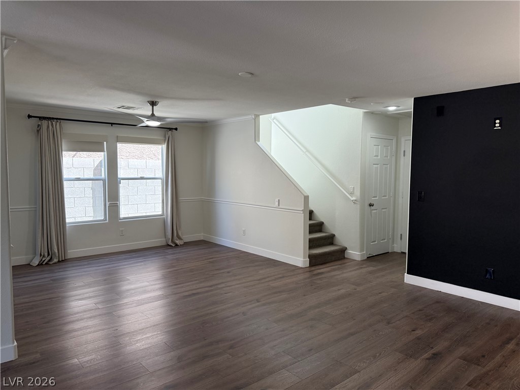 1141 Cathedral Ridge Street Henderson, NV 89052 - Photo 30 of 77 Bright and airy interior space with durable flooring and convenient staircase access.
