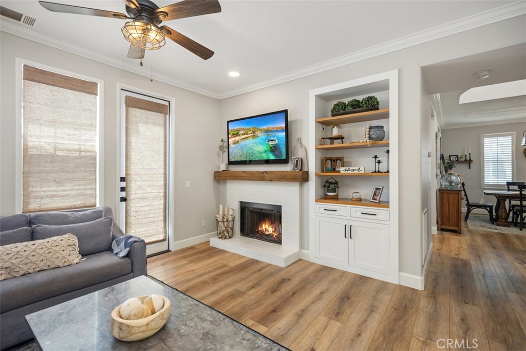 42 Livingston Place Ladera Ranch, CA 92694 - Photo 20 of 34 a living room with furniture and a fireplace