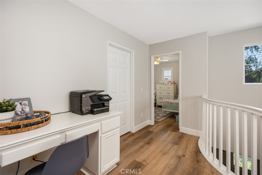 42 Livingston Place Ladera Ranch, CA 92694 - Photo 23 of 34 a kitchen with sink microwave and refrigerator