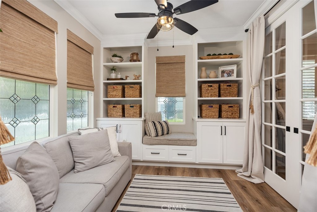 42 Livingston Place Ladera Ranch, CA 92694 - Photo 7 of 34 a living room with furniture and a rug