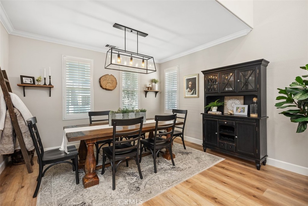 42 Livingston Place Ladera Ranch, CA 92694 - Photo 9 of 34 a view of a dining room with furniture