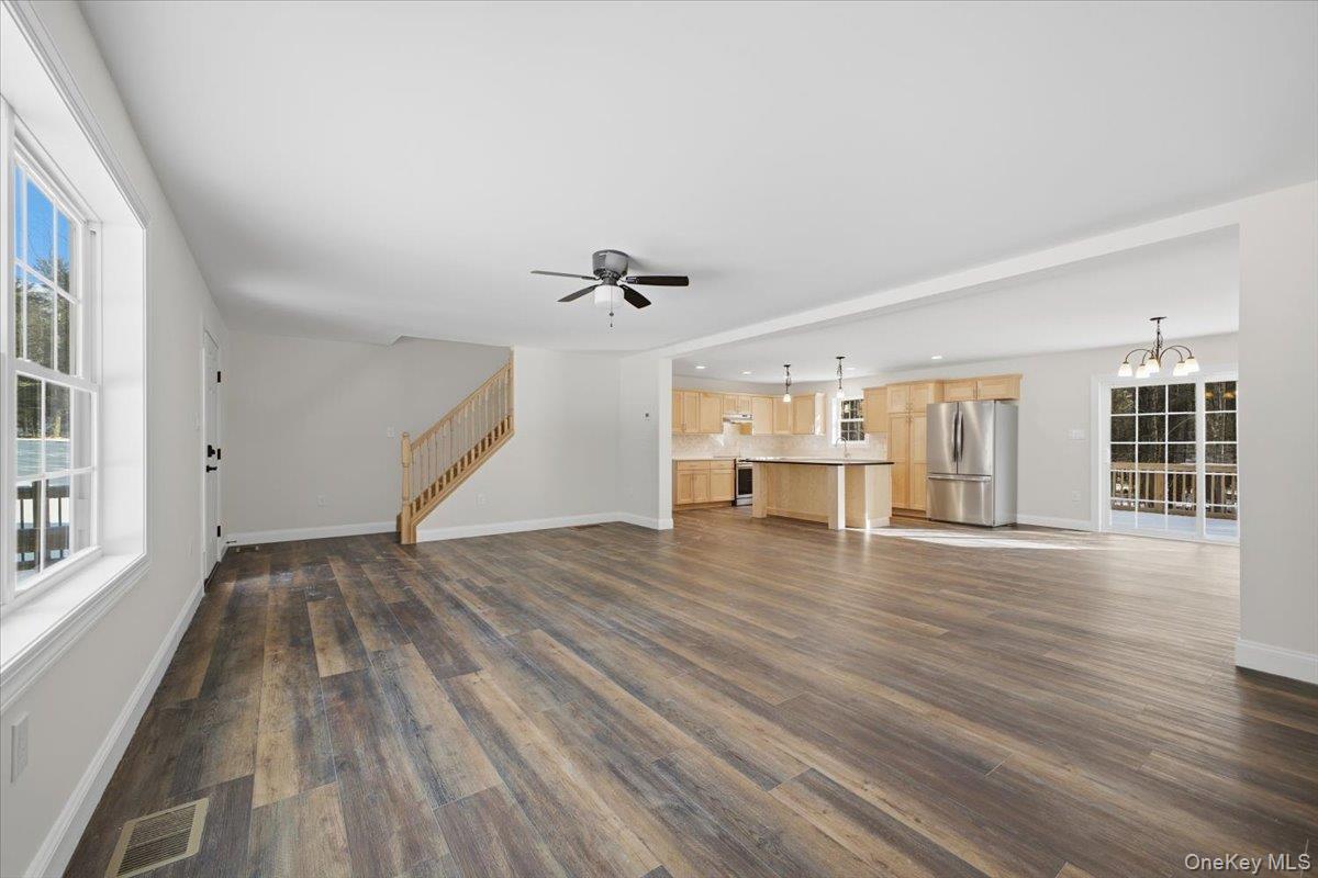 196 Fawn Hill Road Prattsville, NY 12468 - Photo 13 of 45 wooden floor in an empty room with a window