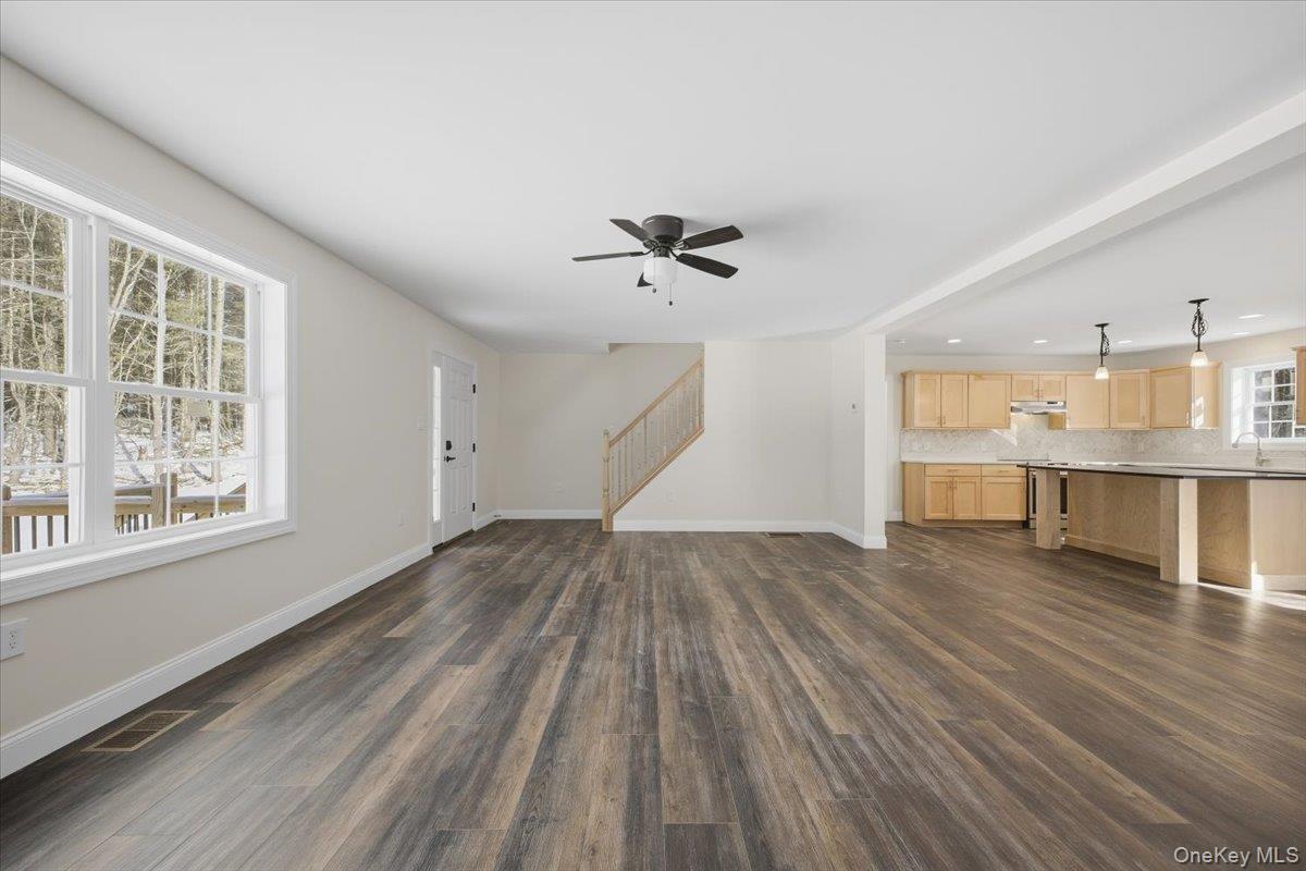 196 Fawn Hill Road Prattsville, NY 12468 - Photo 14 of 45 wooden floor in an empty room with a window