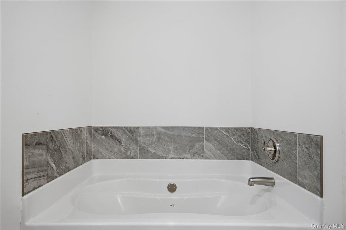 196 Fawn Hill Road Prattsville, NY 12468 - Photo 31 of 45 a bathroom with a bath tub