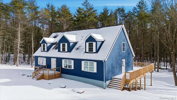 a front view of a house with a patio