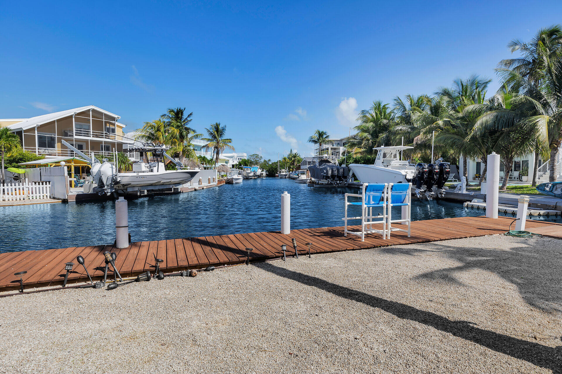 Undisclosed Address Key Largo, FL 33037 - Photo 23 of 69 a view of swimming pool with outdoor seating and yard in the back