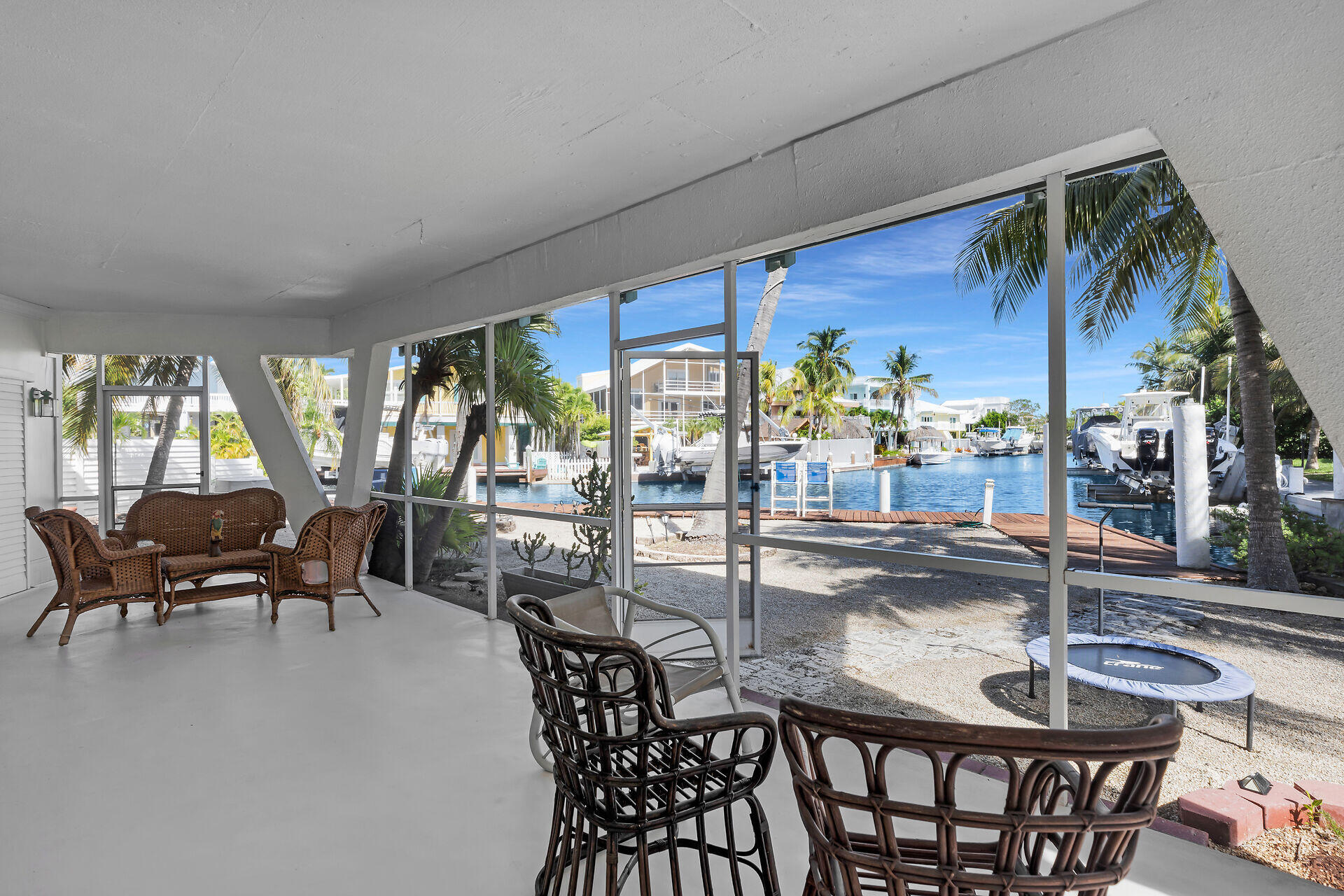 Undisclosed Address Key Largo, FL 33037 - Photo 26 of 69 a dining room with furniture and a floor to ceiling window