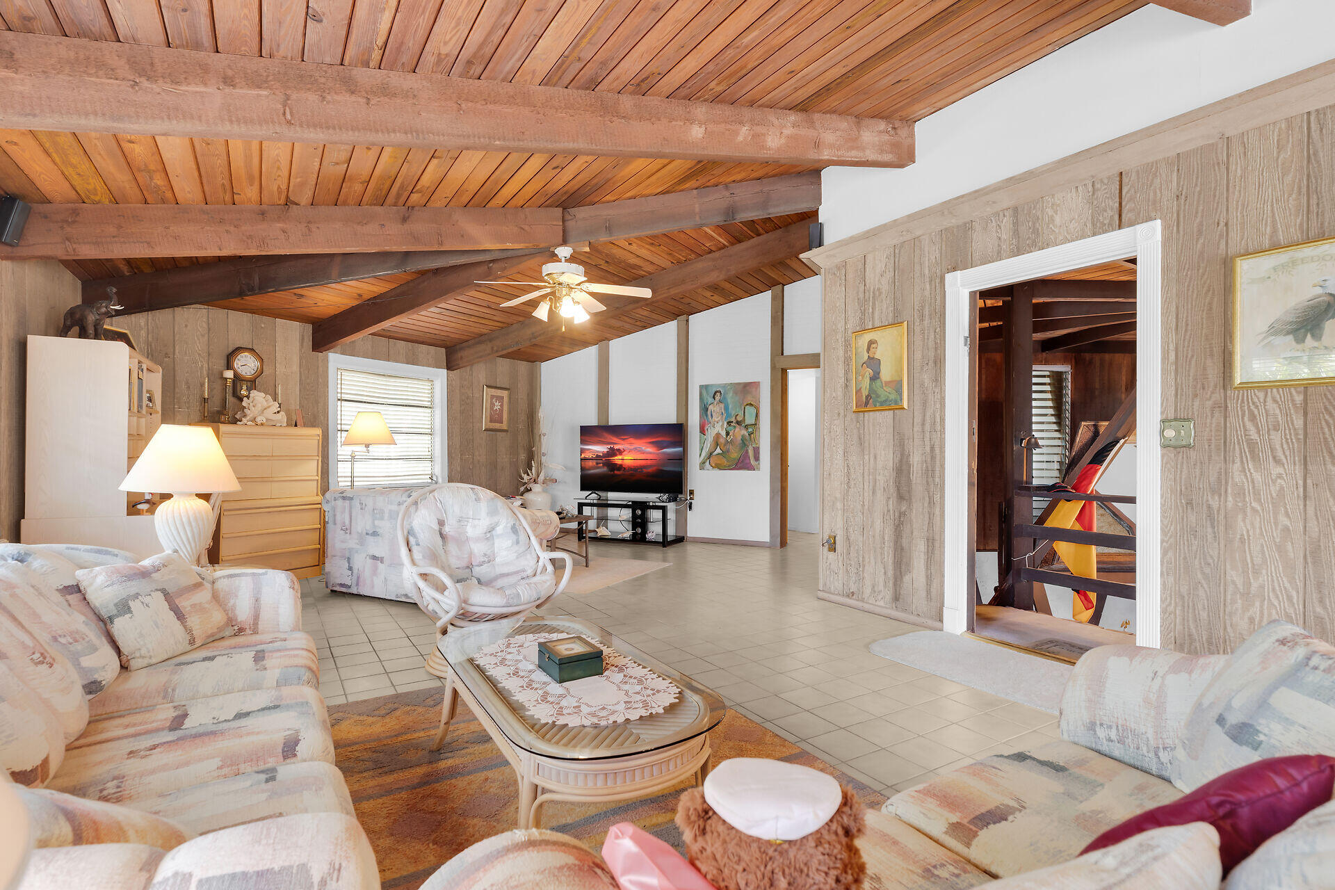 Undisclosed Address Key Largo, FL 33037 - Photo 39 of 69 a living room with furniture and wooden floor