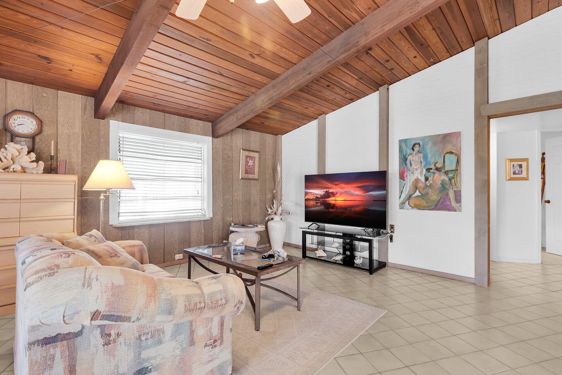 Undisclosed Address Key Largo, FL 33037 - Photo 41 of 69 a living room with furniture and a flat screen tv