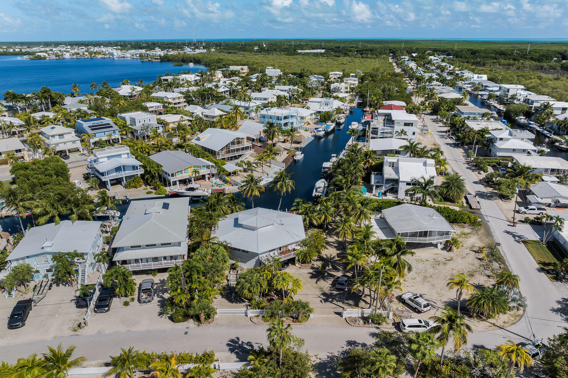 Undisclosed Address Key Largo, FL 33037 - Photo 62 of 69 an aerial view of residential houses with outdoor space