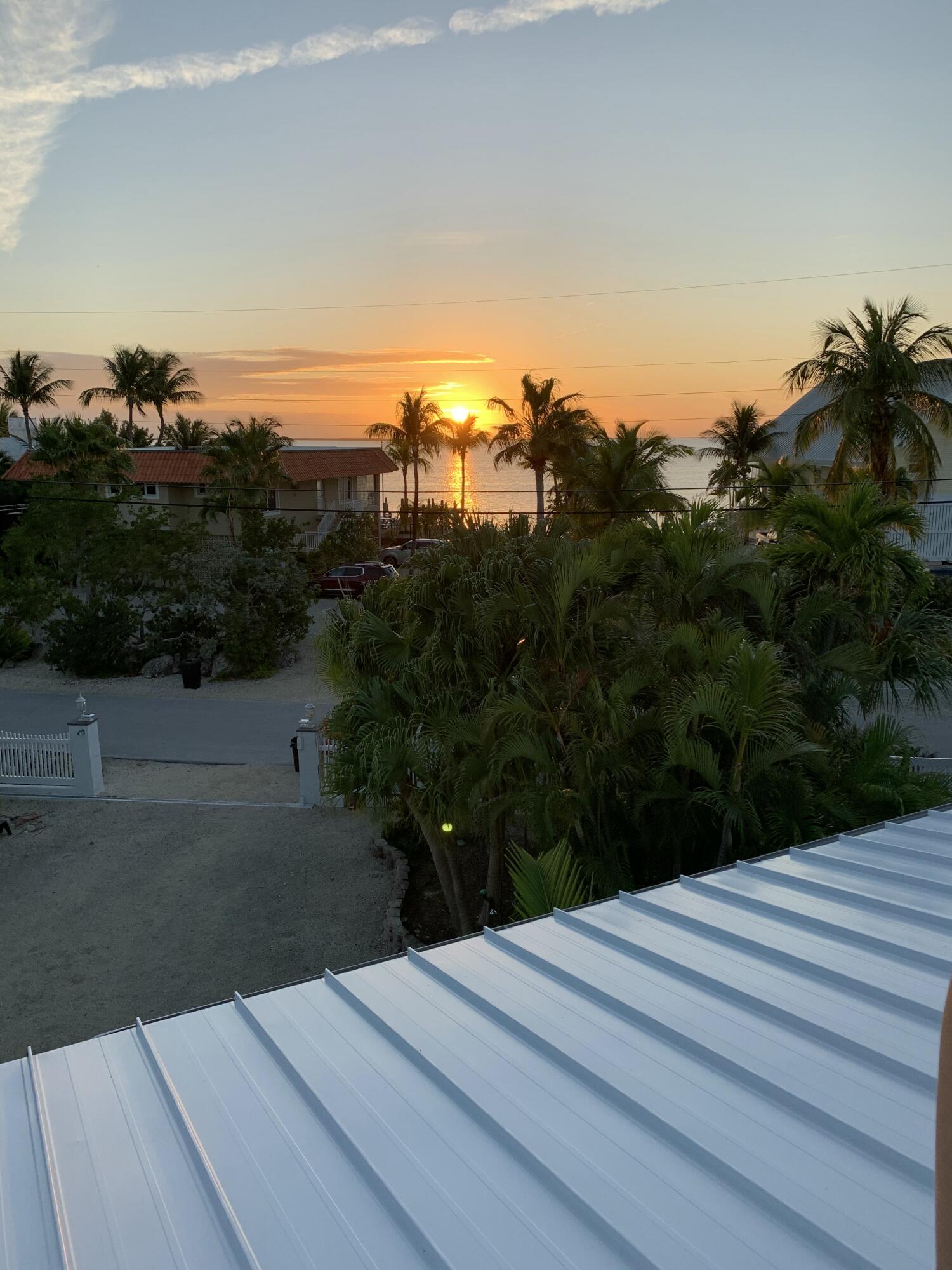 Undisclosed Address Key Largo, FL 33037 - Photo 68 of 69 a view of a backyard