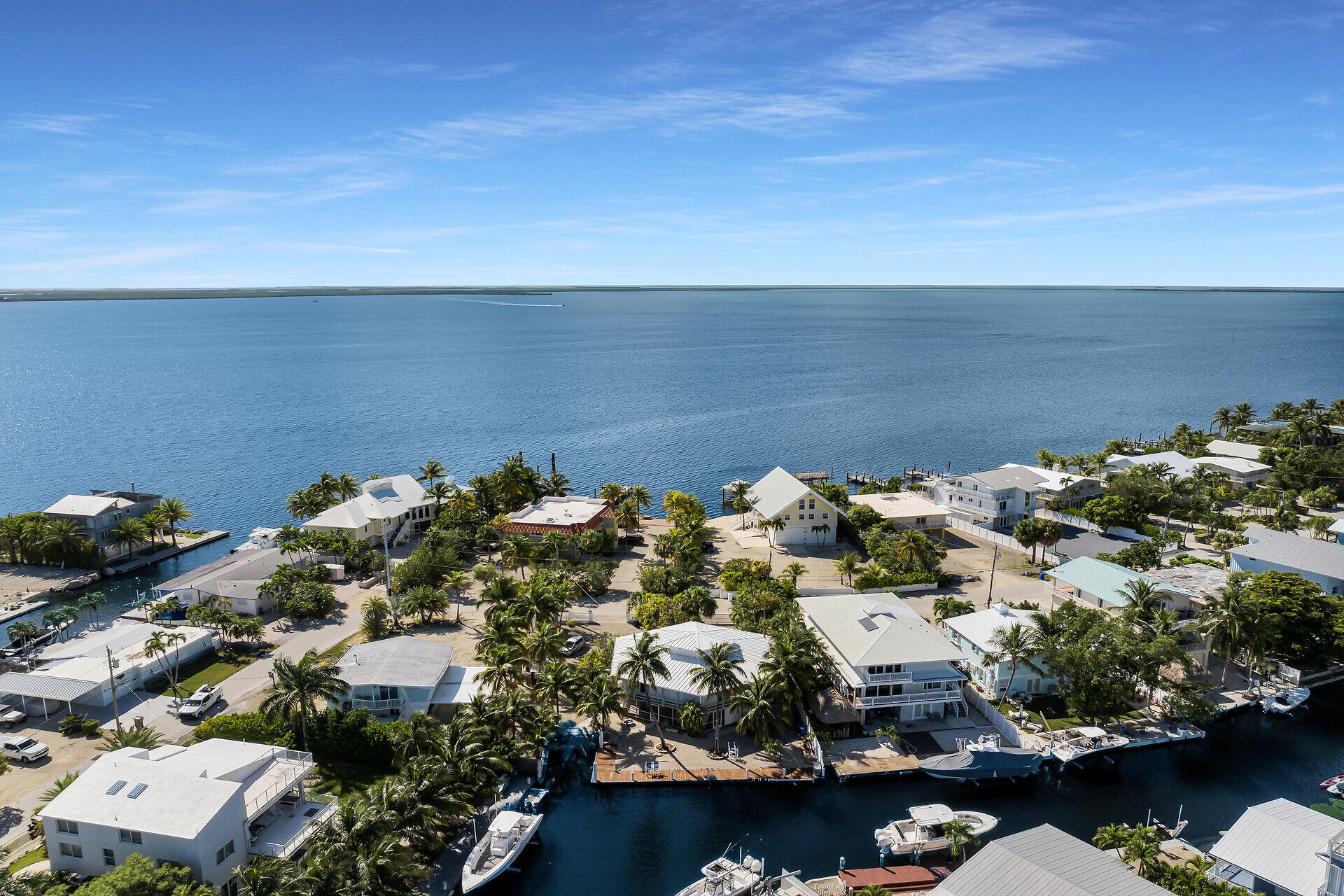 Undisclosed Address Key Largo, FL 33037 - Photo 7 of 69 an aerial view of a houses with ocean view