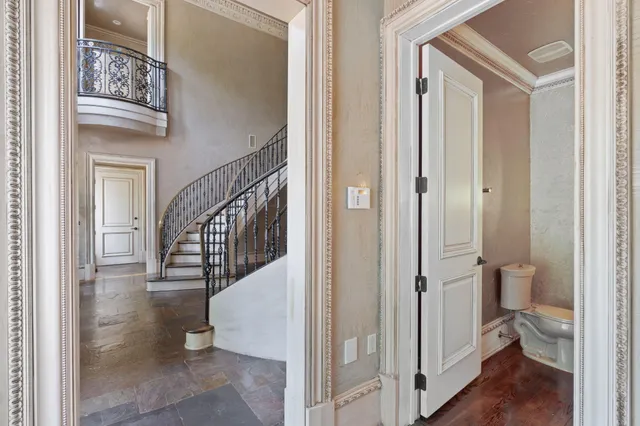 a kitchen with stainless steel appliances granite countertop a stove and a refrigerator