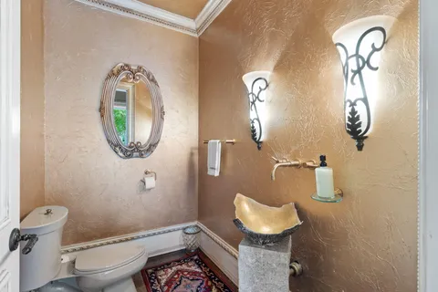 a living room with furniture a window and a table