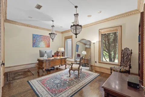 a view of entryway with wooden floor
