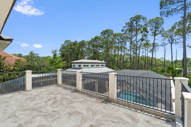 a view of a livingroom with furniture and a flat screen tv