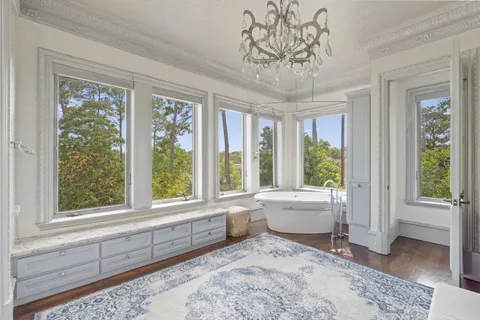 a front view of a house with a yard and a garage