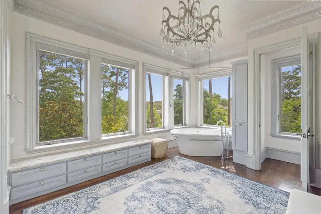 a front view of a house with a yard and a garage