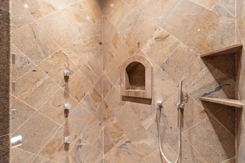 a view of a street with an ocean view