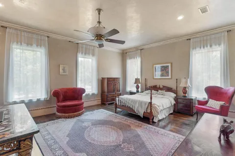 a view of swimming pool with a yard and sitting area