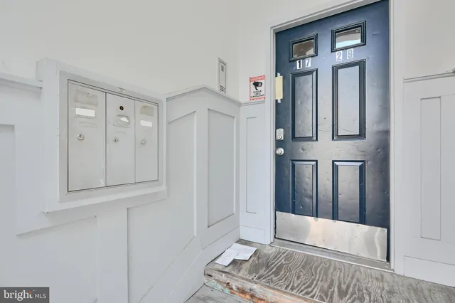 a view of livingroom with furniture and window