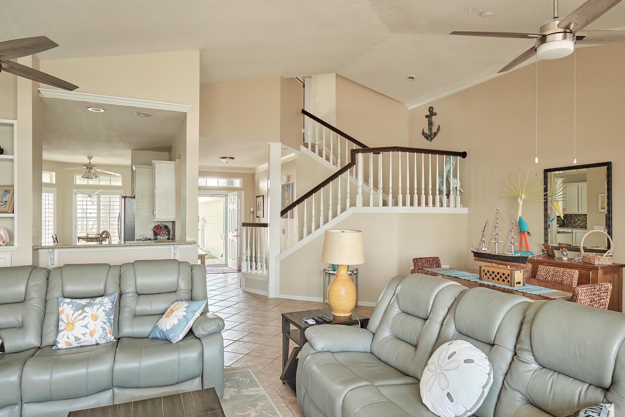 9257 July Lane St. Augustine, FL 32080 - Photo 16 of 48 a living room with furniture and a large window