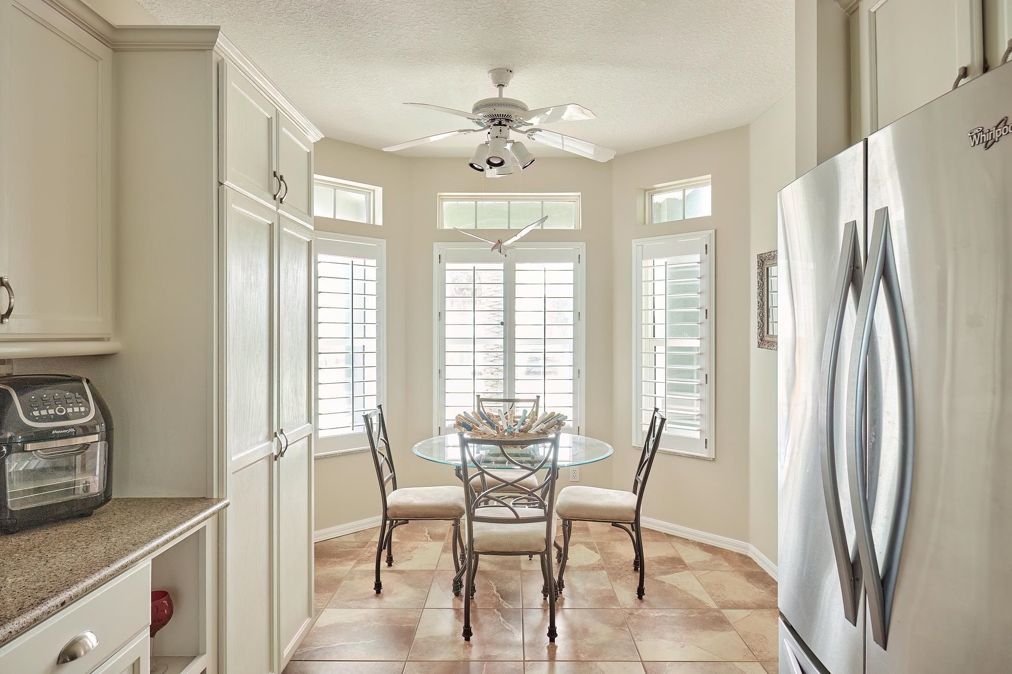 9257 July Lane St. Augustine, FL 32080 - Photo 22 of 48 a view of a dining room with furniture window and outside view