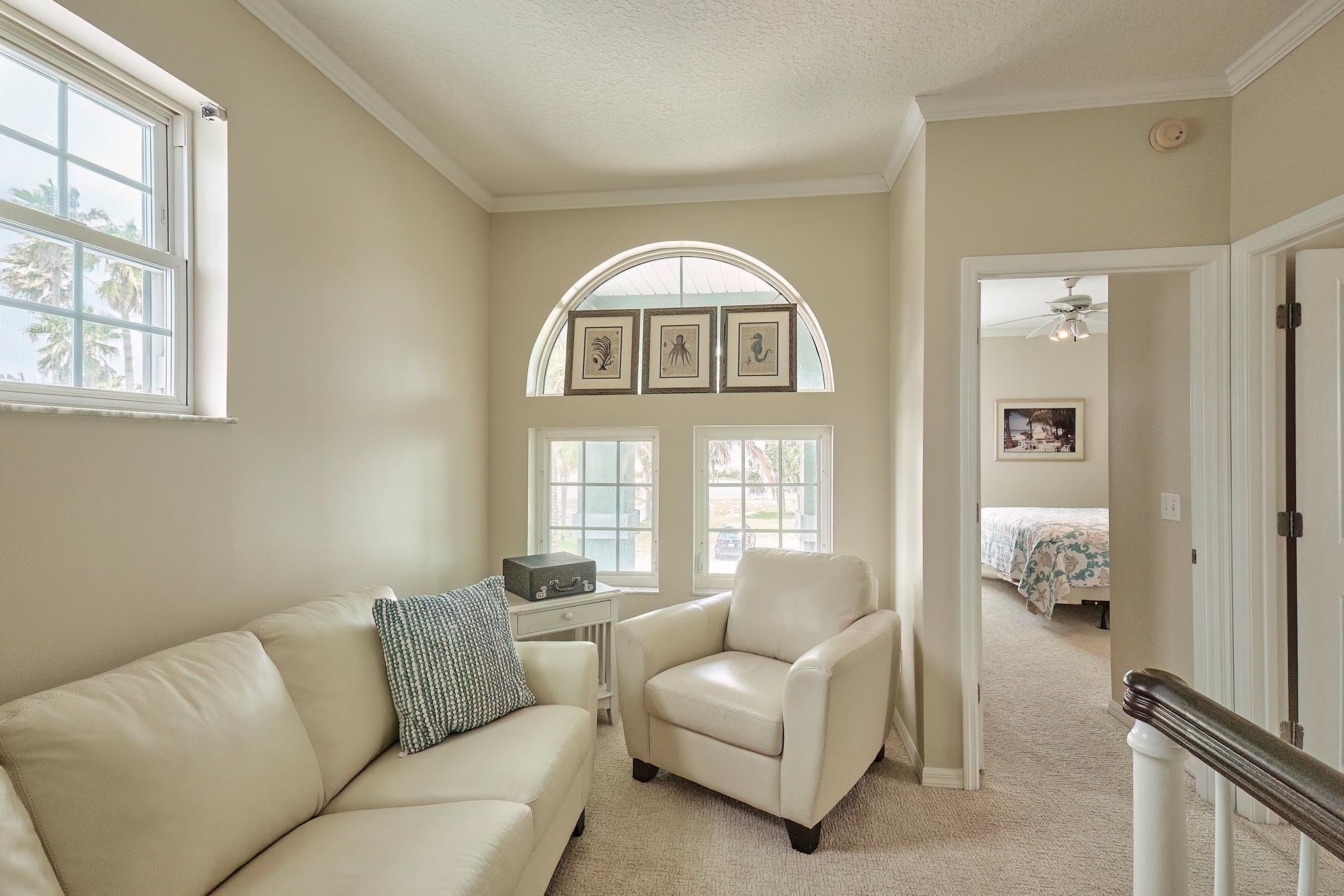 9257 July Lane St. Augustine, FL 32080 - Photo 36 of 48 a living room with furniture and a window